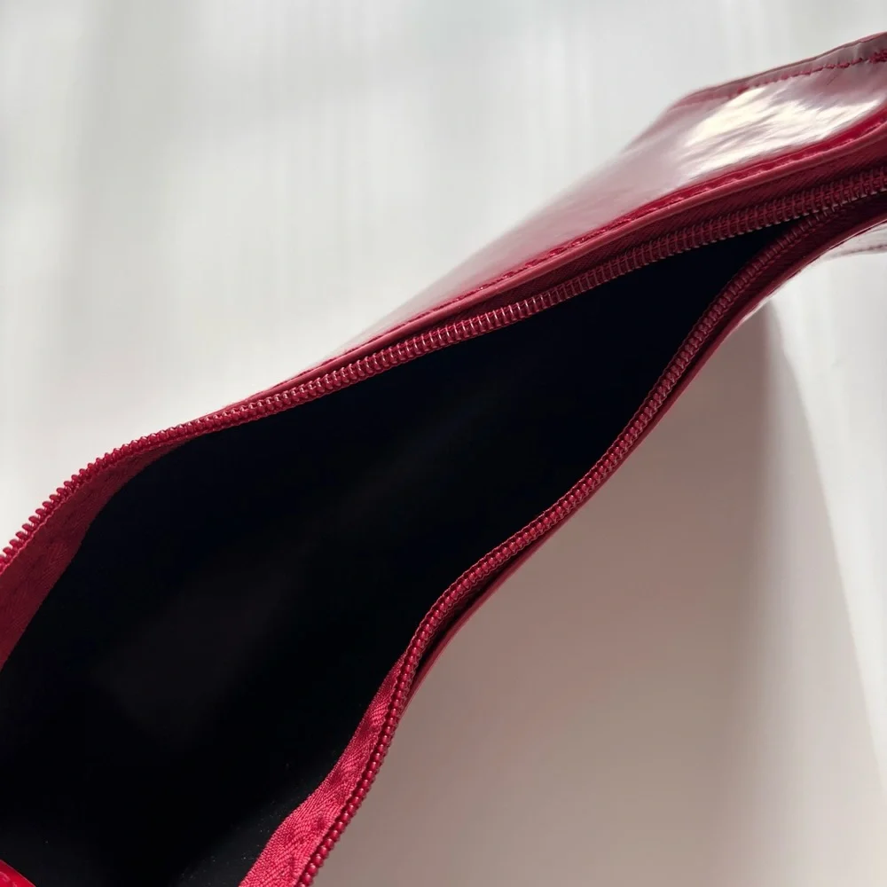 burgundy shoulder bag with gold zipper